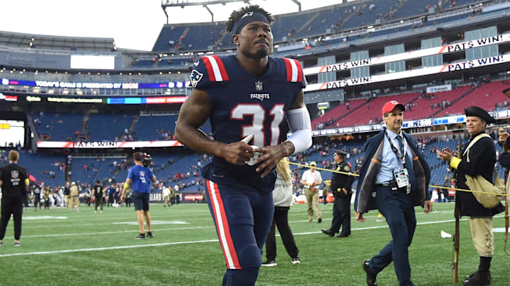 Nov 6, 2022; Foxborough, Massachusetts, USA;  New England Patriots cornerback Jonathan Jones (31) jogs off the field after defeating the Indianapolis Colts at Gillette Stadium. Mandatory Credit: Bob DeChiara-Imagn Images