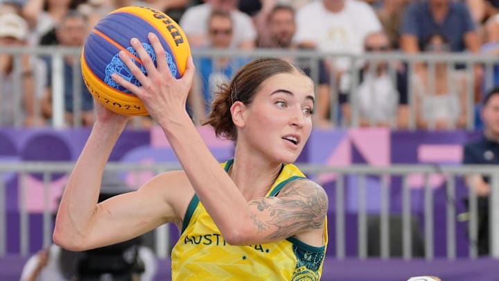 Aug 1, 2024; Paris, France; Australia player Anneli Maley (24) grabs a rebound against the United States in a pool round game during the Paris 2024 Olympic Summer Games at La Concorde 1. Mandatory Credit: Kirby Lee-Imagn Images