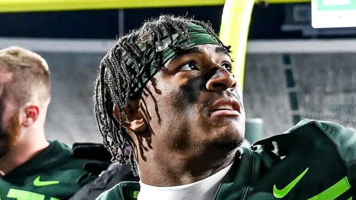 Seattle Seahawks wide receiver Montorie Foster Jr. waves to fans during a college game