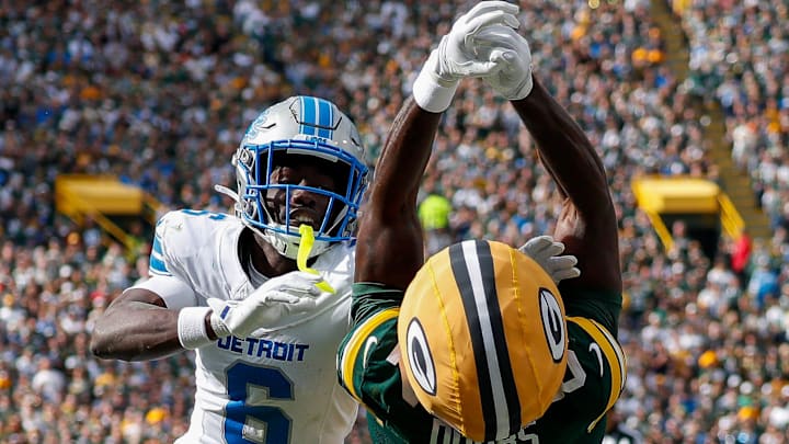 Detroit Lions cornerback Terrion Arnold (6) breaks up a pass intended for Green Bay Packers 