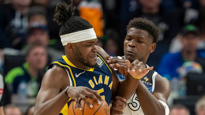 Mar 17, 2025; Minneapolis, Minnesota, USA; Indiana Pacers forward Jarace Walker (5) drives to the basket as Minnesota Timberwolves guard Anthony Edwards (5) plays defense in the first half at Target Center. Mandatory Credit: Jesse Johnson-Imagn Images Mar 17, 2025; Minneapolis, Minnesota, USA; Indiana Pacers forward Jarace Walker (5) drives to the basket as Minnesota Timberwolves guard Anthony Edwards (5) plays defense in the first half at Target Center. Mandatory Credit: Jesse Johnson-Imagn Images