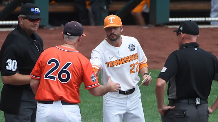 Tennessee Volunteers head coach Tony Vitello and Virginia Cavaliers head coach Brian O'Connor meet before the game at TD Ameritrade Park. Tennessee Volunteers head coach Tony Vitello and Virginia Cavaliers head coach Brian O'Connor meet before the game at TD Ameritrade Park.