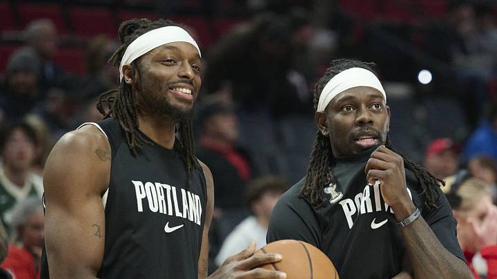Mar 25, 2026; Portland, Oregon, USA; From left, Portland Trail Blazers forward Jerami Grant (9), guard Jrue Holiday (5), and center Robert Williams III (35) warm up before a game against the Milwaukee Bucks at Moda Center. Mandatory Credit: Troy Wayrynen-Imagn Images