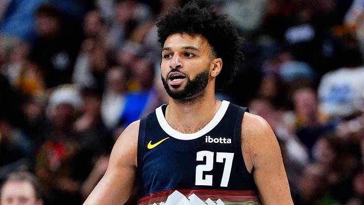 Dec 25, 2025; Denver, Colorado, USA; Denver Nuggets guard Jamal Murray (27) reacts against the Minnesota Timberwolves during the second half at Ball Arena. Mandatory Credit: Ron Chenoy-Imagn Images Dec 25, 2025; Denver, Colorado, USA; Denver Nuggets guard Jamal Murray (27) reacts against the Minnesota Timberwolves during the second half at Ball Arena. Mandatory Credit: Ron Chenoy-Imagn Images