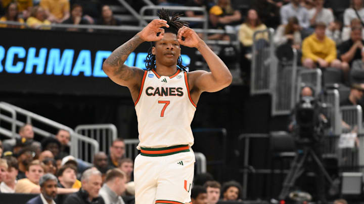 Mar 20, 2026; St. Louis, MO, USA; Miami (FL) Hurricanes forward Shelton Henderson (7) reacts after a three point shot play during the second half against Missouri Tigers during a first round game of the men's 2026 NCAA Tournament at Enterprise Center. Mandatory Credit: Jeff Curry-Imagn Images
