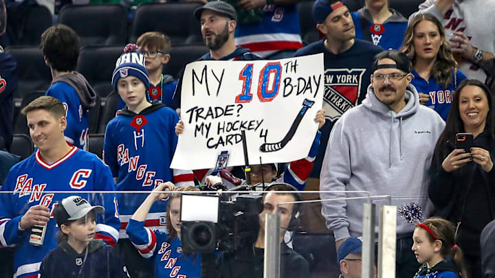 Mar 16, 2025; New York, New York, USA; New York Rangers fans hold a sign during the first period against the Edmonton Oilers at Madison Square Garden. Mandatory Credit: Danny Wild-Imagn Images