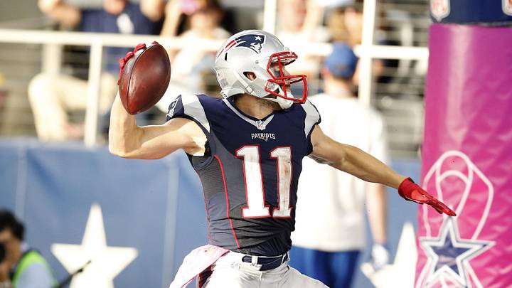 Oct 11, 2015; Arlington, TX, USA; New England Patriots receiver Julian Edelman (11) spikes the ball to celebrate his fourth quarter touchdown against the Dallas Cowboys at AT&T Stadium. Mandatory Credit: Matthew Emmons-Imagn Images Oct 11, 2015; Arlington, TX, USA; New England Patriots receiver Julian Edelman (11) spikes the ball to celebrate his fourth quarter touchdown against the Dallas Cowboys at AT&T Stadium. Mandatory Credit: Matthew Emmons-Imagn Images