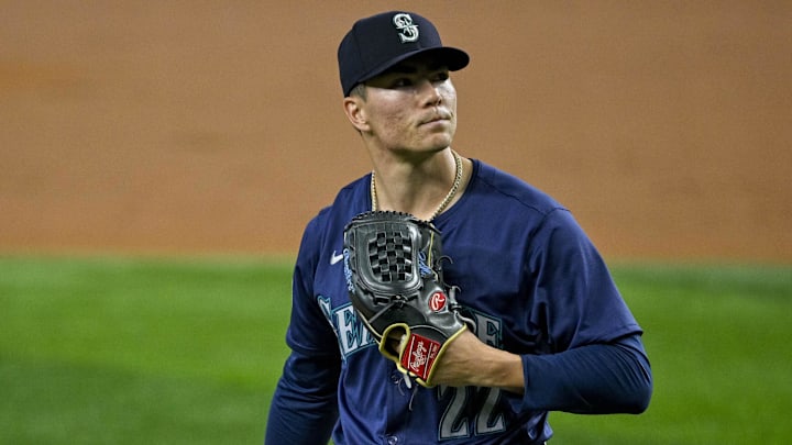 Sep 22, 2024; Arlington, Texas, USA; Seattle Mariners starting pitcher Bryan Woo (22) walks off the field after he pitches against the Texas Rangers during the second inning at Globe Life Field