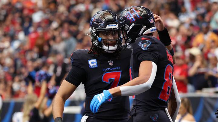 Jan 4, 2026; Houston, Texas, USA;  Houston Texans wide receiver Jayden Higgins (81) reacts with quarterback C.J. Stroud (7) after making a touchdown catch against the Indianapolis Colts during the first half at NRG Stadium. Mandatory Credit: Thomas Shea-Imagn Images