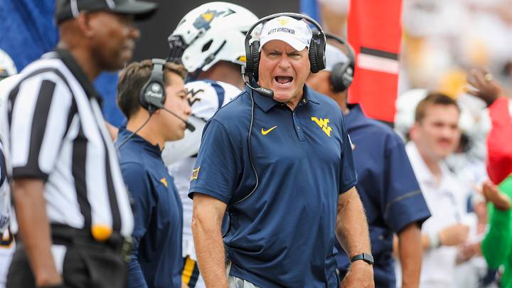 Sep 5, 2026; Morgantown, West Virginia, USA;  West Virginia Mountaineers head coach Rich Rodriguez yells at an official during the third quarter against the Coastal Carolina Chanticleers at Milan Puskar Stadium.  Mandatory Credit: Ben Queen-Imagn Images