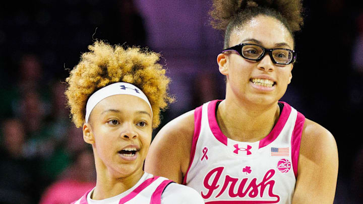 Notre Dame guard Hannah Hidalgo (3) and guard Olivia Miles (5) celebrate a three point shot made by Hidalgo