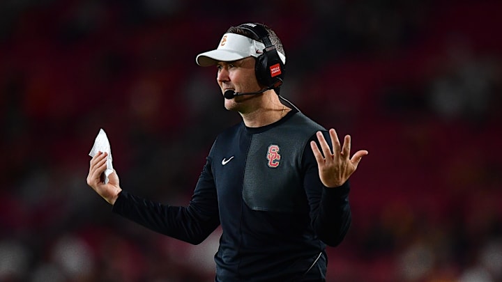 Sep 20, 2025; Los Angeles, California, USA; Southern California Trojans head coach Lincoln Riley watches game action against the Michigan State Spartans during the second half at the Los Angeles Memorial Coliseum. Mandatory Credit: Gary A. Vasquez-Imagn Images