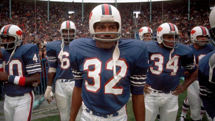 Buffalo Bills running back (32) O.J. Simpson during pre-game introductions prior to a game against the Miami Dolphins at War Memorial Stadium. Buffalo Bills running back (32) O.J. Simpson during pre-game introductions prior to a game against the Miami Dolphins at War Memorial Stadium.