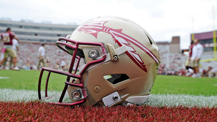 View of a Florida State Seminoles helmet on the field before the game against the Miami Hurricanes.