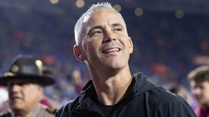 Florida State Seminoles head coach Mike Norvell smiles to the crowd after the game against the Florida Gators at Steve Spurrier Field at Ben Hill Griffin Stadium in Gainesville, FL on Saturday, November 25, 2023. [Matt Pendleton/Gainesville Sun]