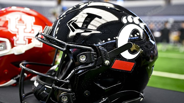 Jul 12, 2023; Arlington, TX, USA; A view of the Cincinnati Bearcats helmet and logo during Big 12 football media day at AT&T Stadium. Mandatory Credit: Jerome Miron-Imagn Images