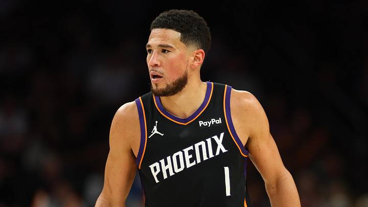 Apr 27, 2026; Phoenix, Arizona, USA; Phoenix Suns guard Devin Booker (1) against the Oklahoma City Thunder during game four of the first round of the 2026 NBA Playoffs at Mortgage Matchup Center. Mandatory Credit: Mark J. Rebilas-Imagn Images

