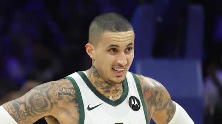 Jan 27, 2026; Philadelphia, Pennsylvania, USA; Philadelphia 76ers guard Vj Edgecombe (77) reacts to guard Jared McCain (20) three pointer in front of Milwaukee Bucks forward Kyle Kuzma (18) during the fourth quarter at Xfinity Mobile Arena. Mandatory Credit: Bill Streicher-Imagn Images