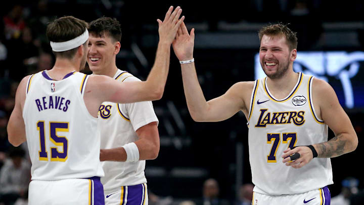 Oct 31, 2025; Memphis, Tennessee, USA; Los Angeles Lakers guard Luka Doncic (77) reacts with guard Austin Reaves (15) during a timeout during the second quarter against the Memphis Grizzlies at FedExForum. Mandatory Credit: Petre Thomas-Imagn Images Oct 31, 2025; Memphis, Tennessee, USA; Los Angeles Lakers guard Luka Doncic (77) reacts with guard Austin Reaves (15) during a timeout during the second quarter against the Memphis Grizzlies at FedExForum. Mandatory Credit: Petre Thomas-Imagn Images