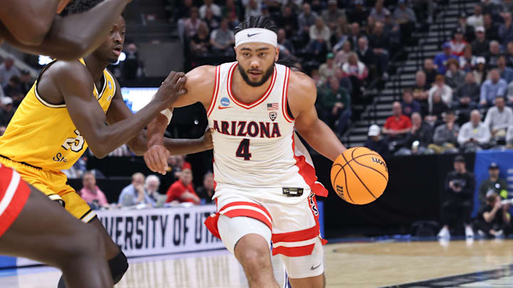 Mar 21, 2024; Salt Lake City, UT, USA;  Arizona Wildcats guard Kylan Boswell (4) dribbles the ball