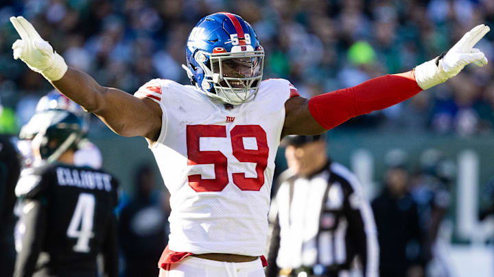 Dec 26, 2021; Philadelphia, Pennsylvania, USA; New York Giants outside linebacker Lorenzo Carter (59) reacts against the Philadelphia Eagles during the second quarter at Lincoln Financial Field. Mandatory Credit: Bill Streicher-Imagn Images