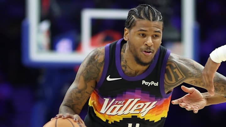 Jan 20, 2026; Philadelphia, Pennsylvania, USA; Phoenix Suns guard Jalen Green (4) drives against Philadelphia 76ers guard Tyrese Maxey (0) during the first quarter at Xfinity Mobile Arena. Mandatory Credit: Bill Streicher-Imagn Images