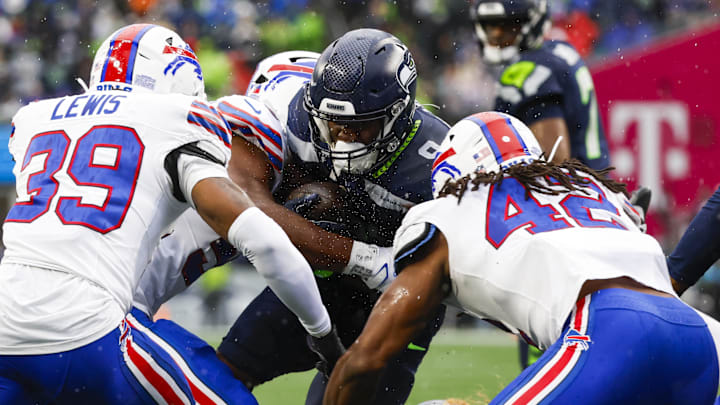 Oct 27, 2024; Seattle, Washington, USA; Seattle Seahawks running back Kenneth Walker III (9) rushes against the Buffalo Bills during the second quarter at Lumen Field. Mandatory Credit: Joe Nicholson-Imagn Images