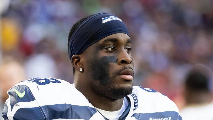 Seattle Seahawks linebacker Derick Hall stands on the sidelines