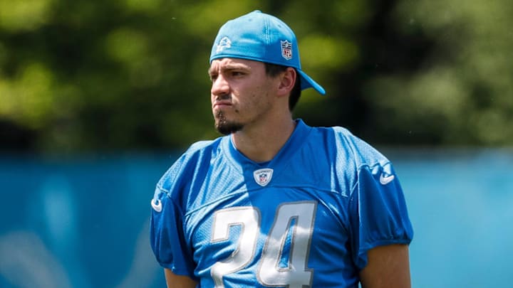 Detroit Lions place kicker John Parker Romo (24) watches practice during OTAs at Detroit Lions headquarters in Allen Park on Thursday, June 1, 2023. Detroit Lions place kicker John Parker Romo (24) watches practice during OTAs at Detroit Lions headquarters in Allen Park on Thursday, June 1, 2023.