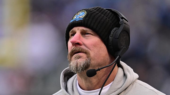 Detroit Lions head coach Dan Campbell stands on the sidelines during a game.
