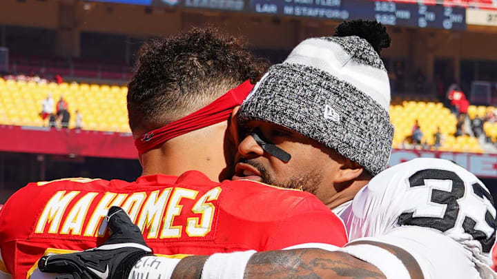 Oct 19, 2025; Kansas City, Missouri, USA; Kansas City Chiefs quarterback Patrick Mahomes (15) and Las Vegas Raiders linebacker Jamal Adams (33) hug after the game at GEHA Field at Arrowhead Stadium. Mandatory Credit: Denny Medley-Imagn Images