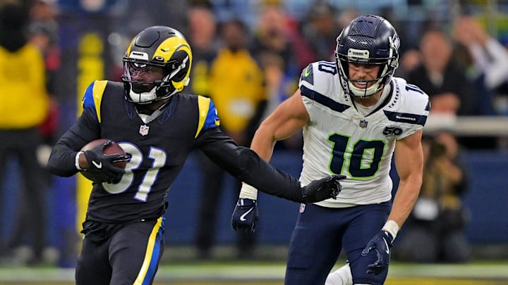Nov 16, 2025; Inglewood, California, USA; Los Angeles Rams cornerback Darious Williams (31) runs the ball after an interception against Seattle Seahawks wide receiver Cooper Kupp (10) during the second half at SoFi Stadium. Mandatory Credit: Jayne Kamin-Oncea-Imagn Images Nov 16, 2025; Inglewood, California, USA; Los Angeles Rams cornerback Darious Williams (31) runs the ball after an interception against Seattle Seahawks wide receiver Cooper Kupp (10) during the second half at SoFi Stadium. Mandatory Credit: Jayne Kamin-Oncea-Imagn Images