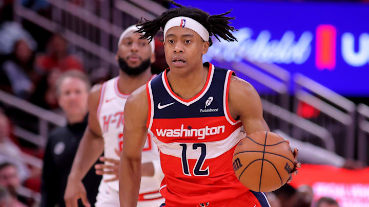 Nov 12, 2025; Houston, Texas, USA; Washington Wizards guard Tre Johnson (12) handles the ball against the Houston Rockets during the game at Toyota Center. Mandatory Credit: Erik Williams-Imagn Images