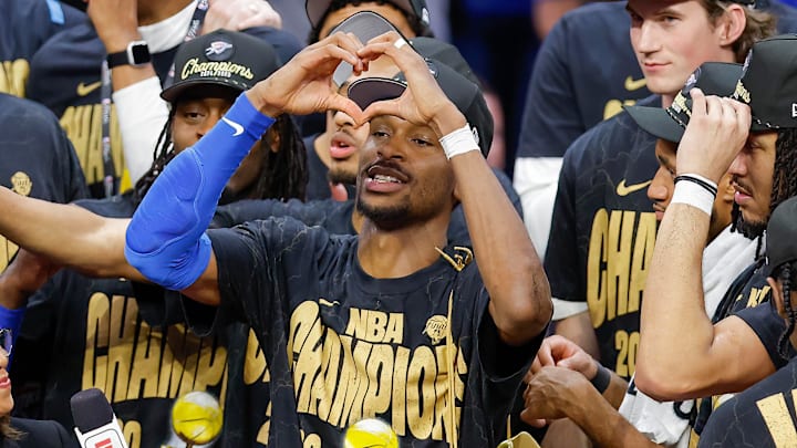 Jun 22, 2025; Oklahoma City, Oklahoma, USA; Oklahoma City Thunder guard Shai Gilgeous-Alexander (2) holds up a heart for fans at the end of game seven of the 2025 NBA Finals after defeating the Indiana Pacers at Paycom Center. Mandatory Credit: Alonzo Adams-Imagn Images Jun 22, 2025; Oklahoma City, Oklahoma, USA; Oklahoma City Thunder guard Shai Gilgeous-Alexander (2) holds up a heart for fans at the end of game seven of the 2025 NBA Finals after defeating the Indiana Pacers at Paycom Center. Mandatory Credit: Alonzo Adams-Imagn Images