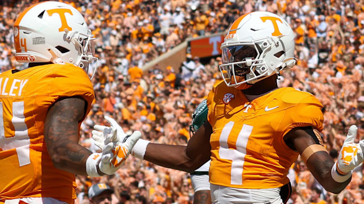 Tennessee Volunteers wide receiver Braylon Staley (14) and wide receiver Mike Matthews (4) celebrate after Matthew’s touchdown against the UAB Blazers during the first quarter at Neyland Stadium.