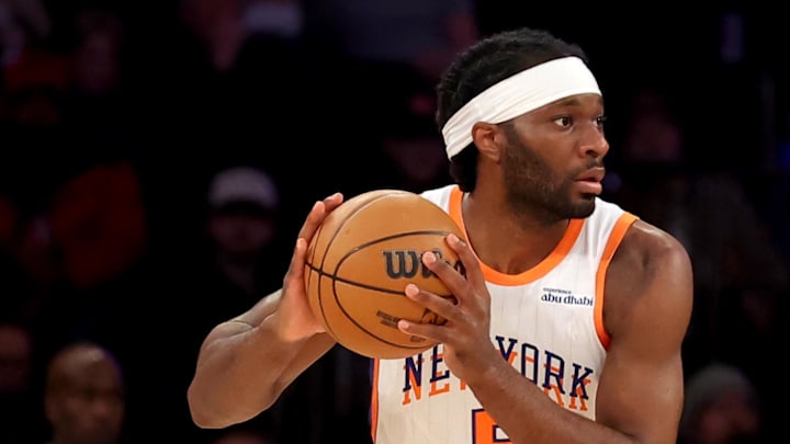 Apr 11, 2025; New York, New York, USA; New York Knicks forward Precious Achiuwa (5) controls the ball against Cleveland Cavaliers center Jarrett Allen (31) during the second quarter at Madison Square Garden. Mandatory Credit: Brad Penner-Imagn Images Apr 11, 2025; New York, New York, USA; New York Knicks forward Precious Achiuwa (5) controls the ball against Cleveland Cavaliers center Jarrett Allen (31) during the second quarter at Madison Square Garden. Mandatory Credit: Brad Penner-Imagn Images
