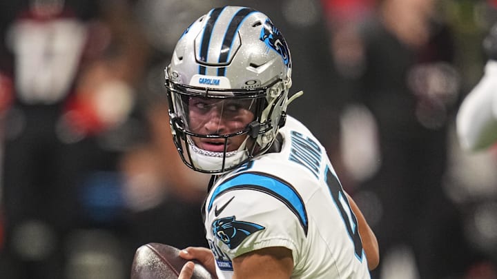 Jan 5, 2025; Atlanta, Georgia, USA; Carolina Panthers quarterback Bryce Young (9) rolls out to pass against the Atlanta Falcons during the first quarter at Mercedes-Benz Stadium. Mandatory Credit: Dale Zanine-Imagn Images