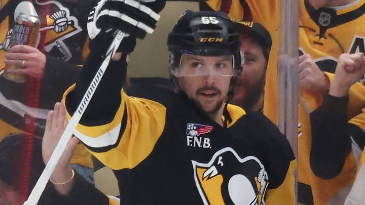 Mar 21, 2026; Pittsburgh, Pennsylvania, USA;  Pittsburgh Penguins defenseman Erik Karlsson (65) reacts after scoring a goal against the Winnipeg Jets during the second period at PPG Paints Arena. Mandatory Credit: Charles LeClaire-Imagn Images