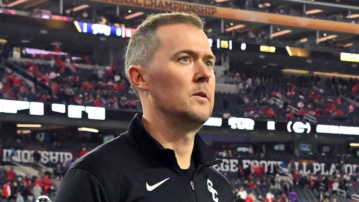 Southern California Trojans head coach Lincoln Riley walks the field before the CFP national championship game between the TCU Horned Frogs and the Georgia Bulldogs at SoFi Stadium. Southern California Trojans head coach Lincoln Riley walks the field before the CFP national championship game between the TCU Horned Frogs and the Georgia Bulldogs at SoFi Stadium.