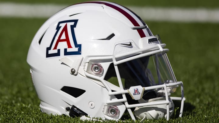 Nov 25, 2022; Tucson, Arizona, USA; Detailed view of an Arizona Wildcats helmet on the field during the Territorial Cup at Arizona Stadium.