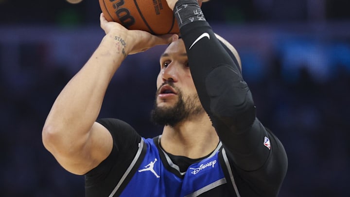 Apr 25, 2026; Orlando, Florida, USA; Orlando Magic guard Jalen Suggs (4) shoots the ball against the Detroit Pistons in the fourth quarter during game three of the first round of the 2026 NBA Playoffs at Kia Center. Mandatory Credit: Nathan Ray Seebeck-Imagn Images