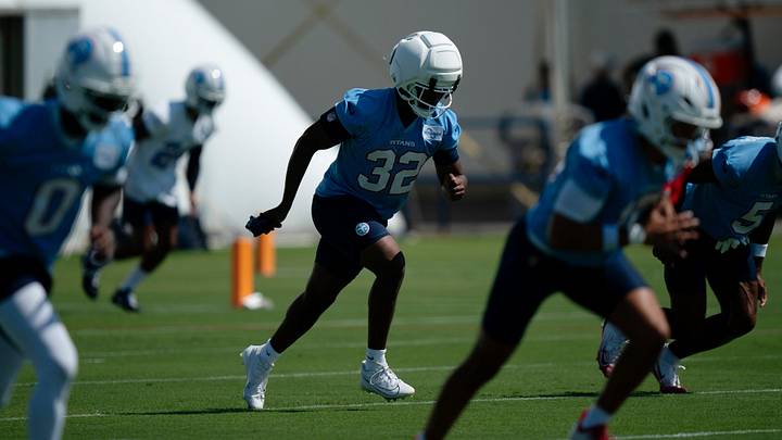 Tennessee Titans running back Nick Singleton (32) goes through stretches on the second day of training camp practice at Vanderbilt Health Football Center Friday, July 30, 2026.