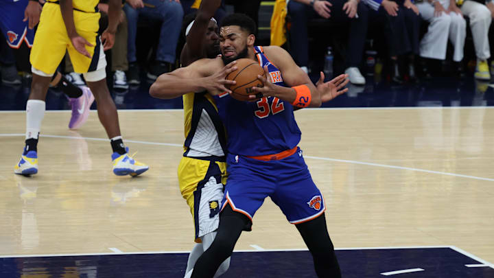 New York Knicks center Karl-Anthony Towns (32) drives to the hoop past Indiana Pacers forward Pascal Siakam (43) during the first quarter of game four of the eastern conference finals for the 2025 NBA Playoffs at Gainbridge Fieldhouse. Mandatory Credit: Trevor Ruszkowski-Imagn Images New York Knicks center Karl-Anthony Towns (32) drives to the hoop past Indiana Pacers forward Pascal Siakam (43) during the first quarter of game four of the eastern conference finals for the 2025 NBA Playoffs at Gainbridge Fieldhouse. Mandatory Credit: Trevor Ruszkowski-Imagn Images