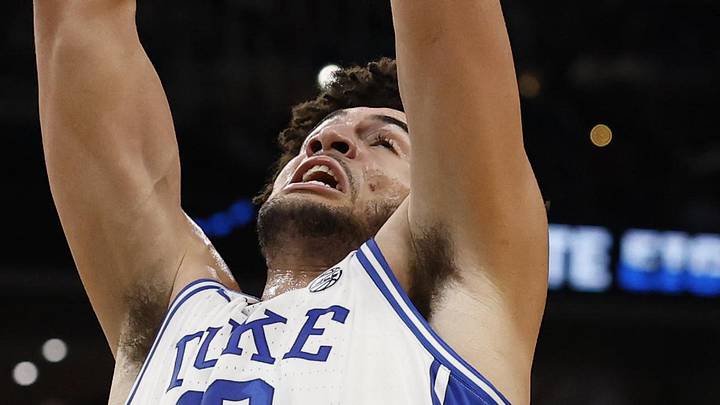 Mar 29, 2026; Washington, DC, USA; Duke Blue Devils forward Cameron Boozer (12) rebounds against the UConn Huskies during an Elite Eight game of the East Regional of the men's 2026 NCAA Tournament at Capital One Arena. Mandatory Credit: Geoff Burke-Imagn Images Mar 29, 2026; Washington, DC, USA; Duke Blue Devils forward Cameron Boozer (12) rebounds against the UConn Huskies during an Elite Eight game of the East Regional of the men's 2026 NCAA Tournament at Capital One Arena. Mandatory Credit: Geoff Burke-Imagn Images