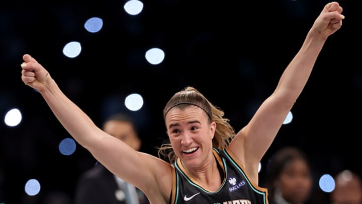 New York Liberty's Sabrina Ionescu celebrates winning a challenge.