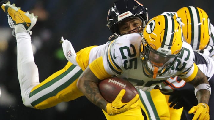 Green Bay Packers cornerback Keisean Nixon is tackled on a kickoff return against the Bears.