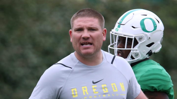 Oregon defensive coordinator Tosh Lupoi directs practice March 29, 2022.
Tosh Lupoi Oregon defensive coordinator Tosh Lupoi directs practice March 29, 2022.
Tosh Lupoi