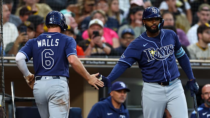 Tampa Bay shortstop Taylor Walls (6) celebrates with Jonathan Aranda during the Rays'  4-2 win over San Diego on Sunday.