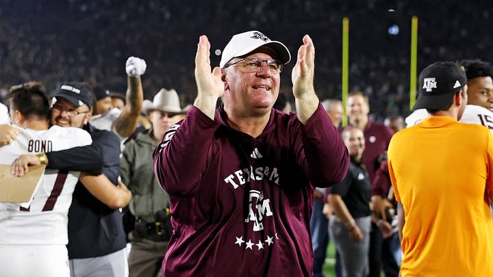 Sep 13, 2025; South Bend, Indiana, USA; Texas A&M Aggies head coach Mike Elko celebrates after the game against Notre Dame Fighting Irish at Notre Dame Stadium. Mandatory Credit: Trevor Ruszkowski-Imagn Images Sep 13, 2025; South Bend, Indiana, USA; Texas A&M Aggies head coach Mike Elko celebrates after the game against Notre Dame Fighting Irish at Notre Dame Stadium. Mandatory Credit: Trevor Ruszkowski-Imagn Images