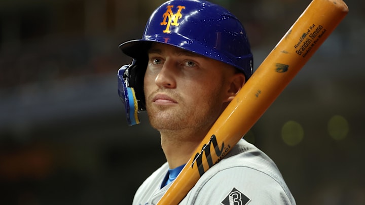 May 4, 2024; St. Petersburg, Florida, USA;  New York Mets outfielder Brandon Nimmo (9) looks on while on deck to bat against the Tampa Bay Rays during the seventh inning at Tropicana Field. Mandatory Credit: Kim Klement Neitzel-Imagn Images